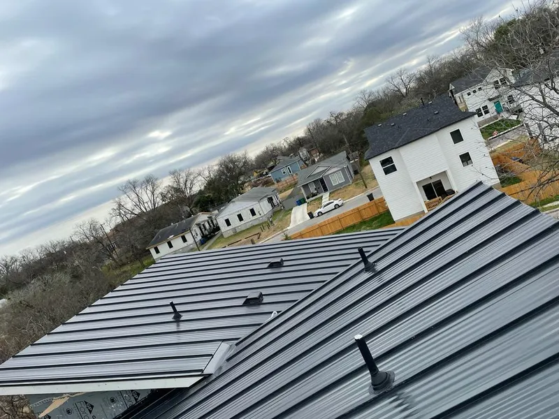 Standing seam metal roof panels with vents for Skylight Repair in East Buffalo